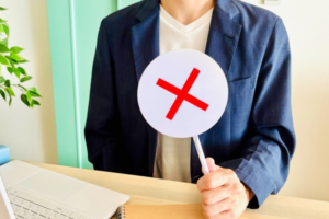 NOサインを出す個人事業主の男性